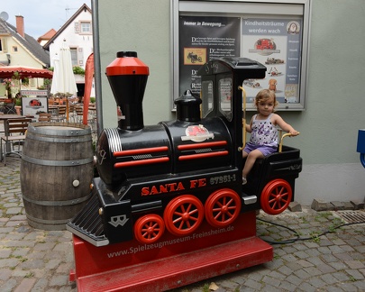 Greta on the train at the toy museum